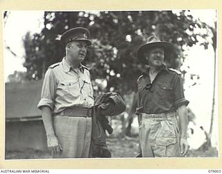 MALMAL VILLAGE, NEW BRITAIN. 1945-02-09. VX19 MAJOR-GENERAL C.S. STEELE, DSO, MC, VD, ENGINEER-IN-CHIEF, LAND HEADQUARTERS (1) AND NX12634 LIEUTENANT-COLONEL W.T. BRIGGS, COMMANDER ROYAL ENGINEERS, ..