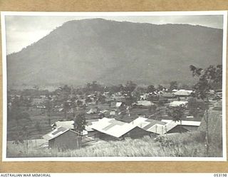 THE SEVENTEEN MILE, PORT MORESBY, NEW GUINEA. 1943-07-03. GENERAL VIEW OF THE 2/9TH AUSTRALIAN GENERAL HOSPITAL SHOWING, IN THE FOREGROUND, THE OPERATING THEATRES AND X-RAY-BLOOD BANK BLOCK, AND ..