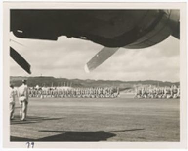 [Servicemen marching during decoration ceremony, Saipan]