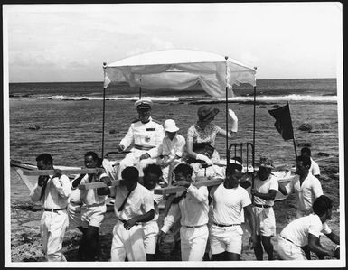 Sir Bernard Fergusson and his family carried ashore, Tokelau