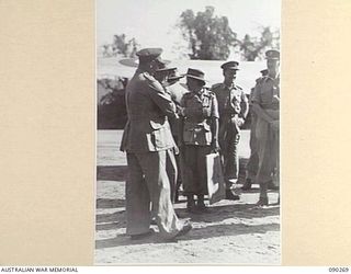 TOROKINA, BOUGAINVILLE. 1945-04-01. LORD WAKEHURST AND THE VICE REGAL PARTY ON PIVA AIRSTRIP, AT THE CONCLUSION OF THEIR TOUR OF THE AREA, PRIOR TO THEIR DEPARTURE FOR TOWNSVILLE