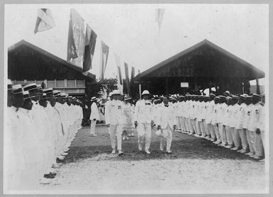 Governor General Sir Charles Fergusson and Judge Ayson inspecting the guard of honour of returned soldiers, Avarua, Cook Islands