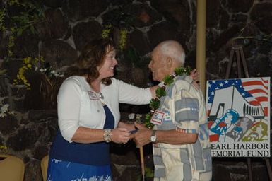 [Assignment: 48-DPA-09-28-08_SOI_K_NPS_Vol_AZ] President's Call to Service Award ceremony and reception for volunteers at the U.S.S. Arizona Memorial, Pearl Harbor, Honolulu, Hawaii, with Secretary Dirk Kempthorne [joining the National Park Service's Chief Historian for the Memorial, Daniel Martinez, among the dignitaries on hand] [48-DPA-09-28-09_SOI_K_NPS_Vol_AZ_IOD_4616.JPG]