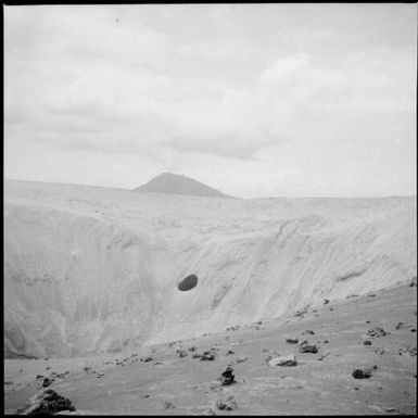 View of a crater with a mountain in the background, Rabaul, New Guinea, 1937 / Sarah Chinnery