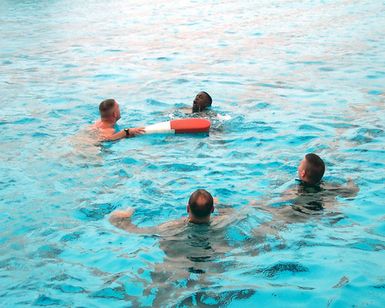 USMC swimming Instructors and personnel assigned to Headquarters Battalion, conduct qualification training at Marine Corp Base Hawaii, Kaneohe Bay