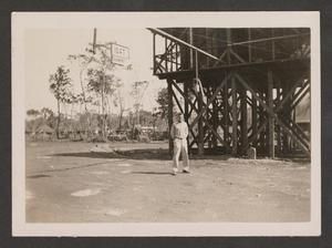 [Man Beside Water Tanks, #3]