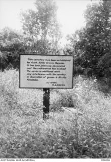 SANANANDA TRAIL, NEW GUINEA, 1945-06-28. THE DEPUTY ASSISTANT DIRECTOR, WAR GRAVES SERVICE SIGN AT THE SANANANDA JAPANESE CEMETERY BESIDE THE SANANANDA TRAIL