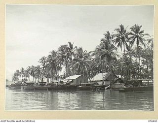 LABU, NEW GUINEA. 1944-10-03. ONE OF THE WHARVES OF THE 55TH PORT CRAFT COMPANY