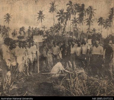 Field Officer instructing group of Farmers