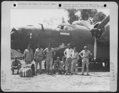 A Crew Pf The 43Rd Bomb Group Pose Beside A Consolidated B-24 'Liberator' At Dobodura Airstrip, Papua, New Guinea. (U.S. Air Force Number 72475AC)