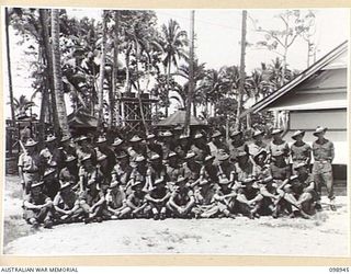 TOROKINA, BOUGAINVILLE, 1945-11-21. MEMBERS OF RESERVE CRAFT SECTION, 42 LANDING CRAFT COMPANY. (FOR IDENTIFICATION OF 43 NAMED PERSONNEL REFER TO PROVISIONAL CAPTION OR NAME INDEX)