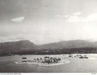 TOROKINA, BOUGAINVILLE ISLAND. 1945. AERIAL VIEW TAKEN BY NO. 5 SQUADRON, RAAF, OF THE ALLIED BASE FROM WHICH OFFENSIVE ACTION WAS TAKEN AGAINST THE JAPANESE, BY UNITS UNDER COMMAND OF THE SECOND ..