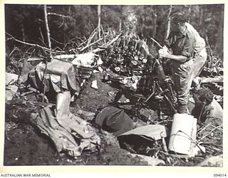 WEWAK AREA, NEW GUINEA, 1945-07-14. MORTAR CREW OF 2/8 INFANTRY BATTALION IN ACTION DURING THE ADVANCE BY A AND B COMPANY, 2/8 INFANTRY BATTALION, AGAINST "THE BLOT"