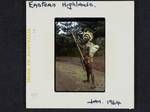 [Man holding bow and arrow], Eastern Highlands, Jan 1964