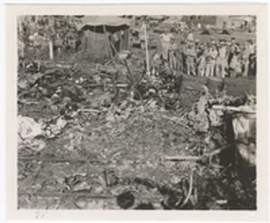 [Servicemen gathered around wreckage of unidentified aircraft, Saipan]