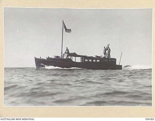 KARAWOP, NEW GUINEA. 1945-07-18. THE WATER TRANSPORT LAUNCH AH1570, WHICH IS NORMALLY STATIONED AT 2/6 CAVALRY (COMMANDO) REGIMENT. IT IS USED TO EVACUATE SICK AND WOUNDED FROM THE KARAWOP AREA