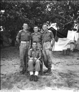 BRANDI, NEW GUINEA, 1945-09-07. OFFICERS OF 35 INFANTRY BATTALION. IDENTIFIED PERSONNEL ARE:- CAPTAIN A.V.C. ADCOCK, ADJUTANT 91); LIEUTENANT F. HAWDON, SIGNAL OFFICER (2); LIEUTENANT C.H.G. ..