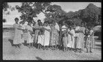 Women holding children