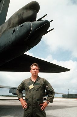 STAFF Sergeant Beau Howard stands beneath the tail turret of a 60th Bombardment Squadron B-52G Stratofortress aircraft