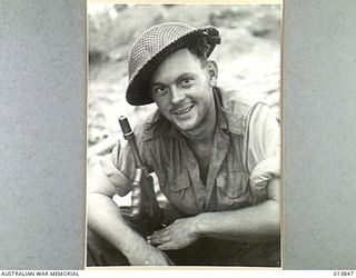 1942-12-16. PAPUA. FALL OF GONA. PTE. LEN, OVENS OF KOORDE. HE IS CREDITED WITH 12 KILLS IN 21 HOURS DURING THE FINAL ASSAULT ON GONA. (NEGATIVE BY G. SILK)