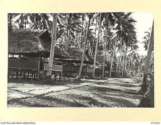 MILNE BAY, NEW GUINEA, 1944-02-10. QUARTERS OF THE AUSTRALIAN NEW GUINEA ADMINISTRATIVE UNIT RECENTLY COMPLETED AT HEADQUARTERS, BARAGA NATIVE LABOUR CAMP