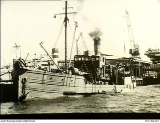 Melbourne, Vic. 1945. Port view of the wooden hulled Uralba tied to Station Pier. In 1942 Uralba was commissioned in the RAN where she operated as a minefield tender and an auxiliary boom defence ..