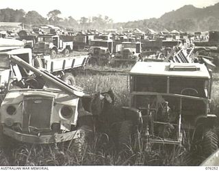 LAE, NEW GUINEA. 1944-09-27. A SECTION OF THE JUNK YARD FOR OLD MOTOR VEHICLES AT THE 43RD FIELD ORDNANCE DEPOT