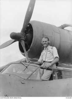 MADANG, NEW GUINEA. C. 1945-01. 414977 FLIGHT LIEUTENANT I. J. WOOD OF CORINDA, QLD, CAPTAIN OF A CATALINA AIRCRAFT OF NO. 111 AIR SEA RESCUE FLIGHT RAAF WHICH FIGURED IN A DRAMATIC RESCUE OF SIX ..