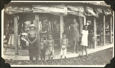Villagers in front of a fale, Samoa, 1929 / C.M. Yonge