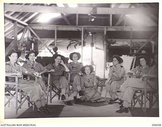 TOROKINA, BOUGAINVILLE, 1945-07-16. SISTERS OF THE AUSTRALIAN ARMY NURSING SERVICE SITTING IN THE SISTERS' MESS, 106 CASUALTY CLEARING STATION