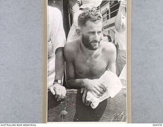 NAZI RAIDER VICTIMS ARRIVE IN AUSTRALIA - BEARDS WERE GROWN BY MANY OF THE MEN WHILE THEY WERE MAROONED ON THE ISLAND EMIRAU