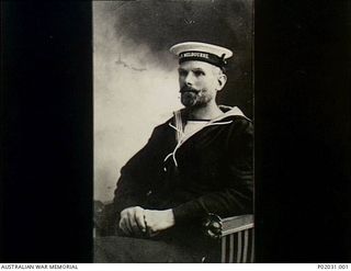 1918. Studio portrait of Petty Officer Hubert Laurence Maynard Greaves RAN wearing his seaman's uniform, his cap bearing an HMAS Melbourne tally band. Petty Officer Greaves served abroad in New ..