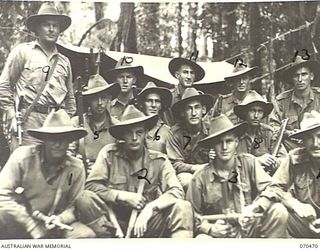 PROTHERO 2 AREA, FARIA RIVER, NEW GUINEA, 1944-02-16. MEMBERS OF NO.1 AND 2 SECTION, NO.7 PLATOON, "A" COMPANY, 57/60TH INFANTRY BATTALION. IDENTIFIED PERSONNEL ARE: QX55035 PRIVATE F.A. MITCHELL ..