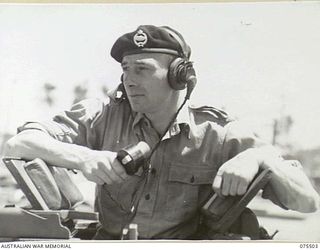 MADANG, NEW GUINEA. 1944-08-23. VB7893703 SERGEANT J. SUTCLIFFE, ROYAL TANK CORPS, CREW COMMANDER, IN THE TURRET OF A CHURCHILL IV TANK. THIS TANK IS ONE OF A CONSIGNMENT OF 32, SIX OF WHICH, 3 ..