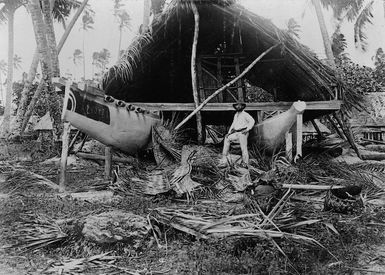 War or double canoe and building, Savai'i, Western Samoa