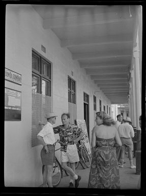 Mr Ron McHardy and Mr G Lynch next to bicycle and store, Tahiti