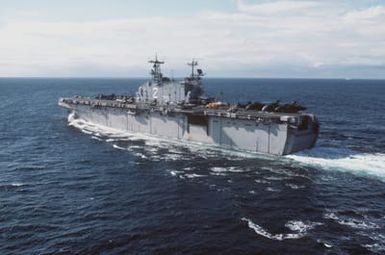 A port quarter view of the amphibious assault ship USS SAIPAN (LHA-2) underway during NATO Exercise Northern Wedding '86