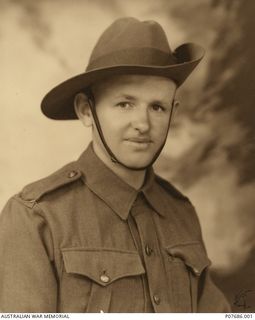 Studio portrait of NX46731 Corporal (Cpl) Sydney James Gordon Reeve, No. 1 Independent Company. Cpl Reeve enlisted on 15 July 1940 and served on the island of New Ireland. He was taken prisoner of ..