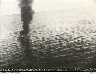 OFF NEW BRITAIN ISLAND, NEW GUINEA. 1943-06-09. A DESTROYED JAPANESE MITSUBISHI BOMBER AIRCRAFT, ALLIED CODE NAME "BETTY", VICTIM OF TWO BEAUFIGHTER AIRCRAFT ENGAGED ON THE WAY TO NEW BRITAIN. THE ..