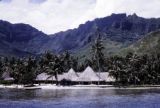 French Polynesia, beach houses on shore of Moorea Island