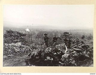 TOL AREA, NEW BRITAIN. 1945-08-02. A PATROL OF INTELLIGENCE SECTION, 16 INFANTRY BATTALION, ON RECONNAISSANCE NEAR CAKE HILL