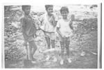 Group of children at excavation site