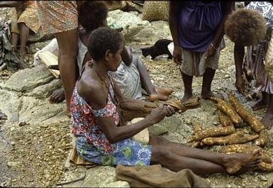 Ben Burt Malaita PhotosWoman selling cassava at market