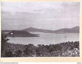 TALILIGAP, NEW BRITAIN, 1945-09-19. THE VIEW OF SIMPSON HARBOUR WITH THE CRATER VULCAN IN THE FOREGROUND. THIS SCENE WAS TAKEN AFTER AUSTRALIAN TROOPS OCCUPIED THE AREA FOLLOWING THE SURRENDER OF ..