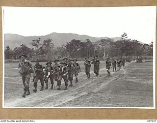 KAIAPIT, NEW GUINEA, 1943-09-27. TROOPS OF THE 2/16TH AUSTRALIAN INFANTRY BATTALION, 7TH AUSTRALIAN DIVISION, MOVING ACROSS THE DRY RIVER BED IN A SECTION OF THE MANIANG RIVER. THEY ARE:- NX131509 ..