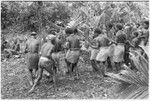 Sango dancers preparing to enter the dance ground; they begin with a song