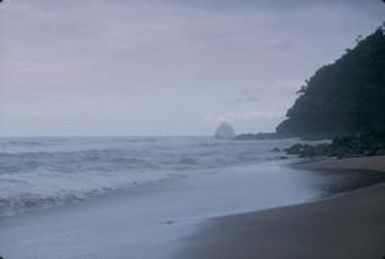 [Wave crashing on rocks at Kauai Island, United States]
