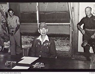 TOROKINA, BOUGAINVILLE. 1945-09-08. LIEUTENANT-GENERAL (LT-GEN) S. G. SAVIGE, GENERAL OFFICER COMMANDING 2 CORPS, ACCEPTED THE SURRENDER OF ALL JAPANESE FORCES ON BOUGAINVILLE FROM LT-GEN M. KANDA, ..