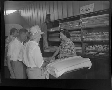 Men buying fabric, Chic Store, Papeete, Tahiti