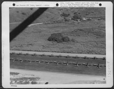 Aerial View Of Inspection Of Republic P-47 "Thunderbolts" Of The 318Th Fighter Group, Prior To Move To Saipan, Marianas Islands. 15 May 1944. Bellows Field, Oahu, Hawaii. (U.S. Air Force Number B63568AC)